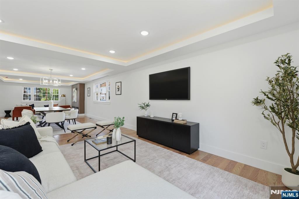 275 Longview Road Union, NJ 07083 - Photo 10 of 43 a living room with furniture and a flat screen tv