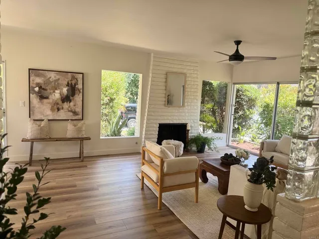 a view of a livingroom with furniture window and outside view