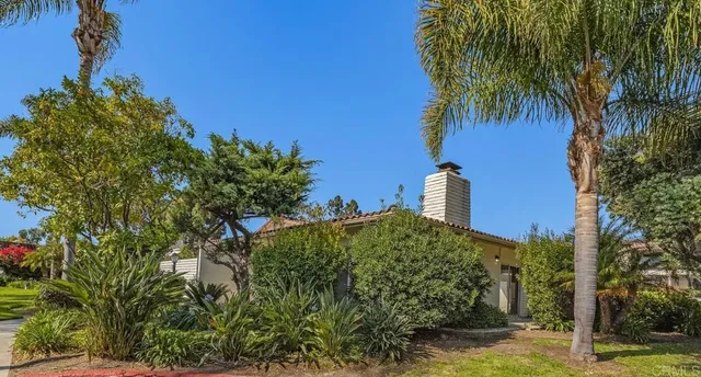 a top view of a house with a yard