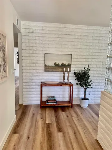 a vase of flowers sitting on a table