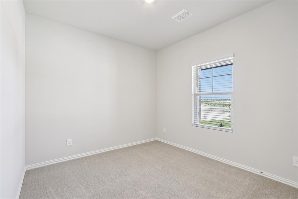 2709 Grand Cyn Street Anna, TX 75409 - Photo 17 of 40 an empty room with a window