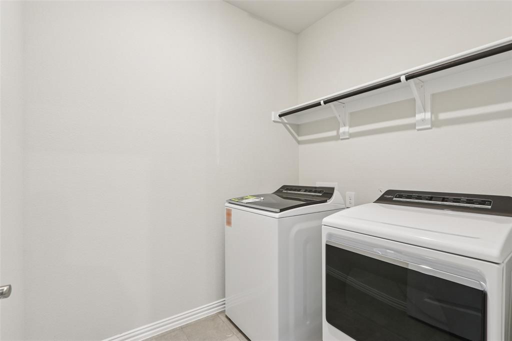 2709 Grand Cyn Street Anna, TX 75409 - Photo 20 of 40 a utility room with dryer and washer