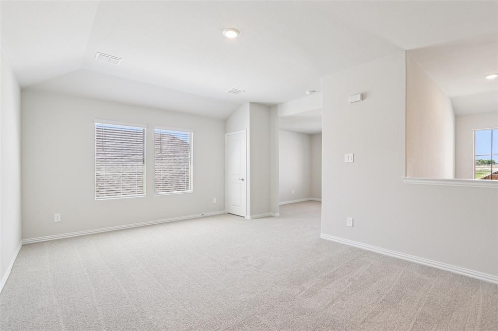 2709 Grand Cyn Street Anna, TX 75409 - Photo 26 of 40 an empty room with windows