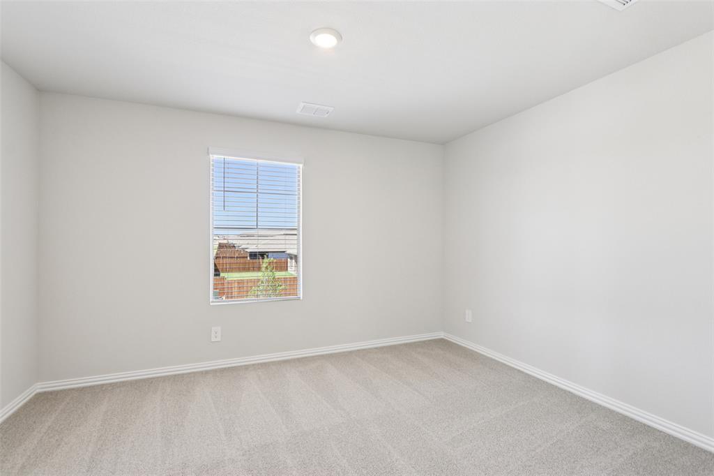 2709 Grand Cyn Street Anna, TX 75409 - Photo 30 of 40 an empty room with a window