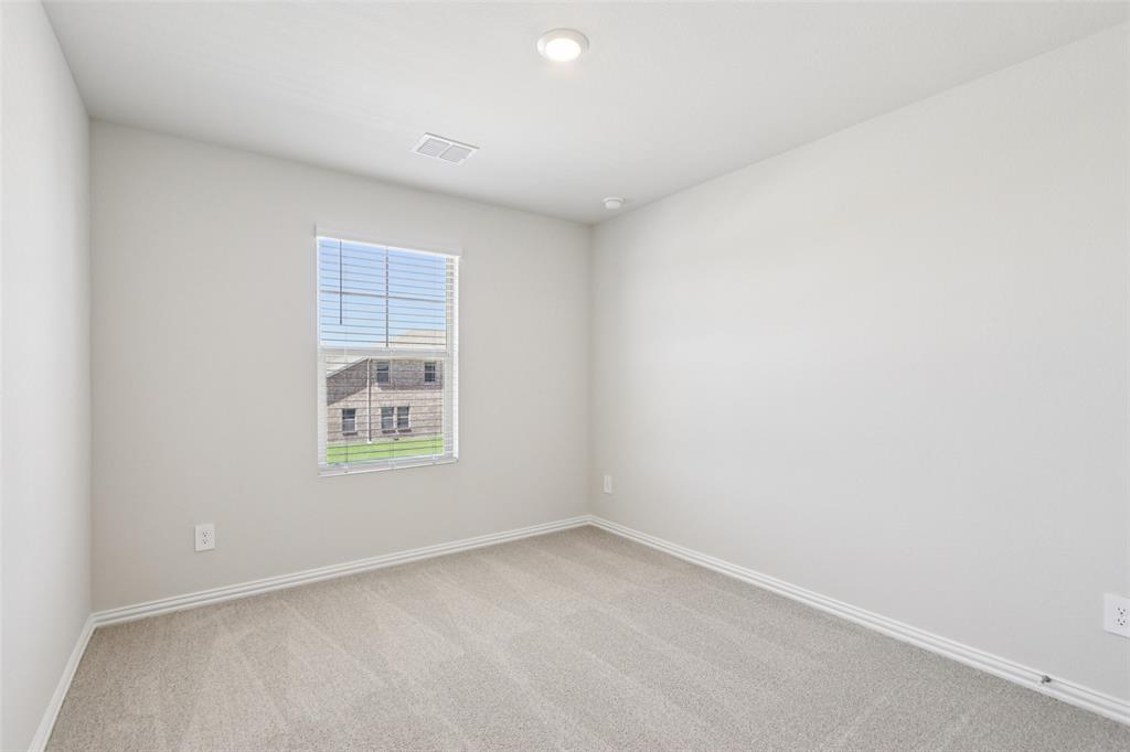 2709 Grand Cyn Street Anna, TX 75409 - Photo 34 of 40 an empty room with a window