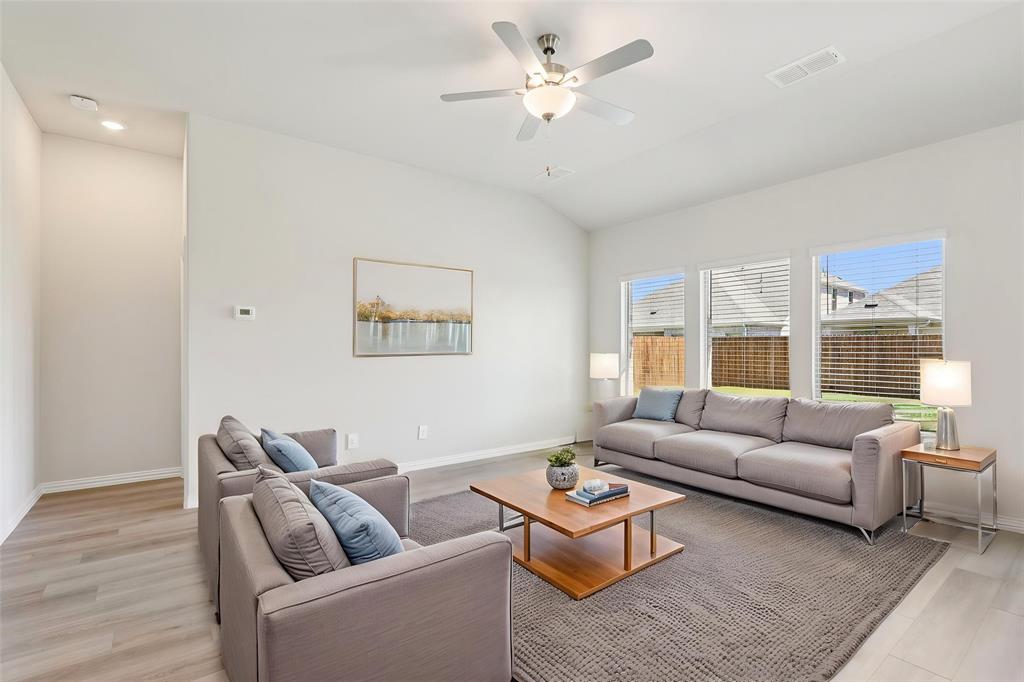 2709 Grand Cyn Street Anna, TX 75409 - Photo 5 of 40 a living room with furniture and a large window