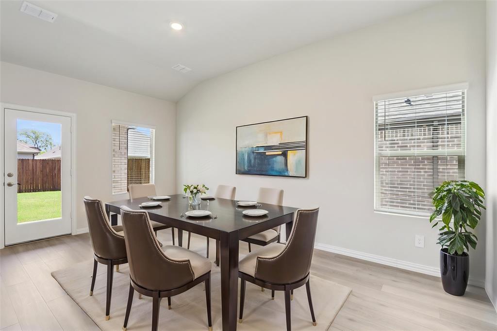 2709 Grand Cyn Street Anna, TX 75409 - Photo 10 of 40 a dining room with furniture and window