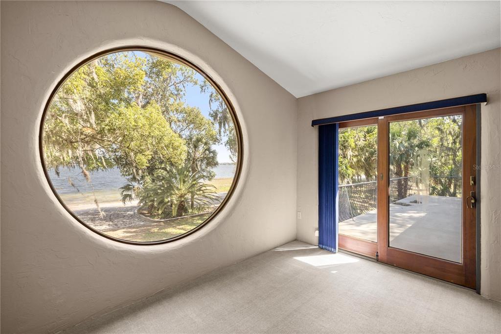 12621 Southeast Sunset Harbor Road Weirsdale, FL 32195 - Photo 29 of 54 an entryway view with a outdoor space
