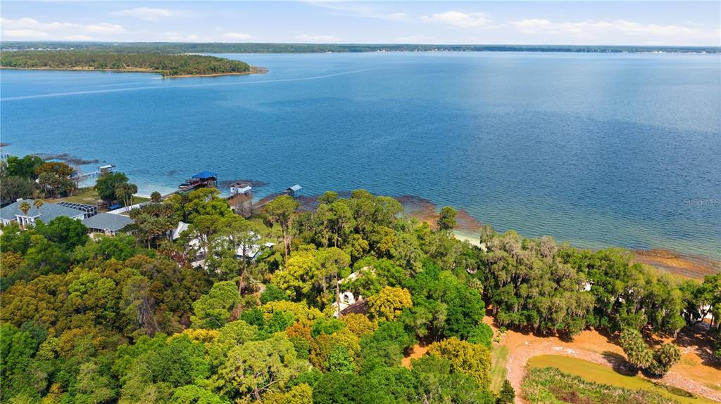 12621 Southeast Sunset Harbor Road Weirsdale, FL 32195 - Photo 54 of 54 a view of a lake