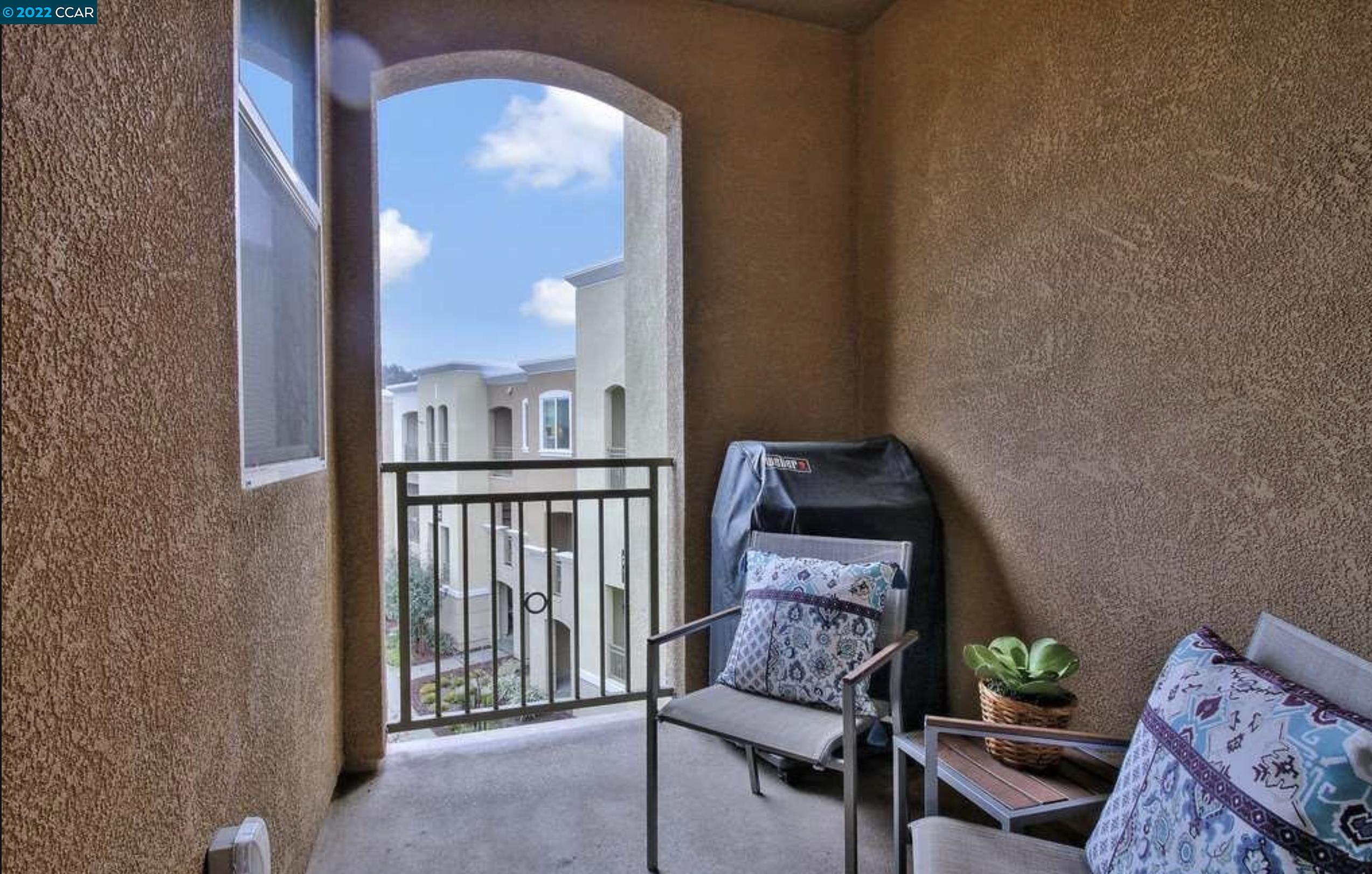 4708 Norris Canyon Road, Unit 204 San Ramon, CA 94583 - Photo 6 of 6 a view of a balcony with furniture