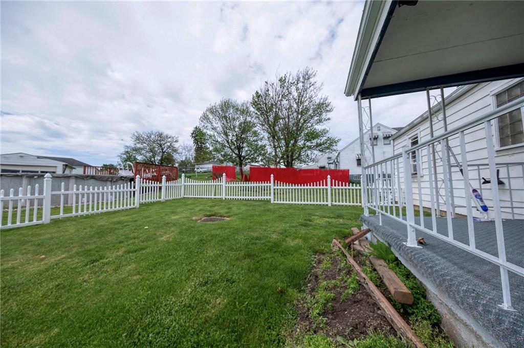 1070 Maple Avenue Washington, PA 15301 - Photo 25 of 28 a view of a garden with a small yard and large trees