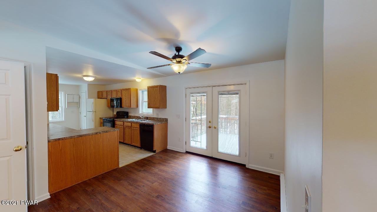 1050 Tomahawk Road Lake Ariel, PA 18436 - Photo 12 of 48 Dining area to back deck