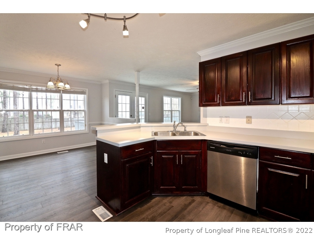 45 Chesapeake Road Cameron, NC 28326 - Photo 11 of 35 a kitchen with a sink and cabinets