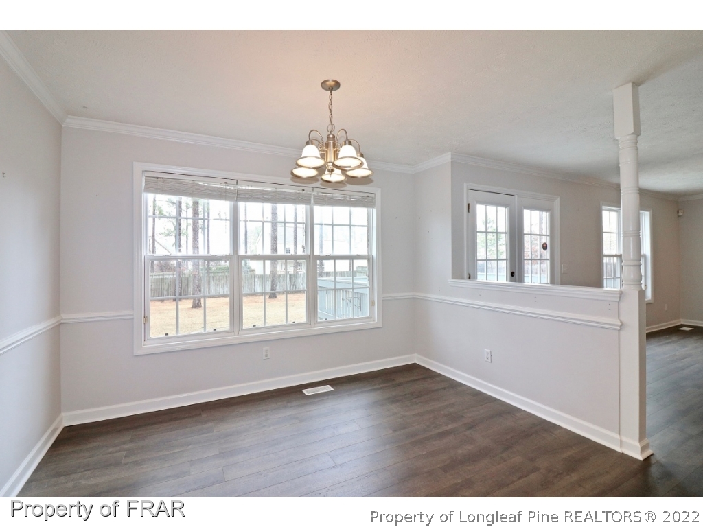 45 Chesapeake Road Cameron, NC 28326 - Photo 12 of 35 a view of an empty room with wooden floor and a window