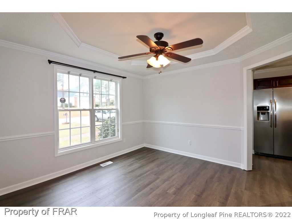 45 Chesapeake Road Cameron, NC 28326 - Photo 3 of 35 a view of an empty room with wooden floor and a window