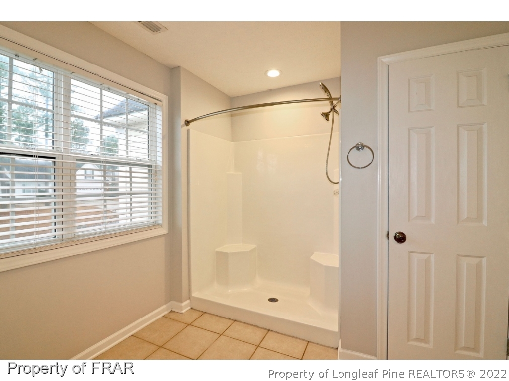 45 Chesapeake Road Cameron, NC 28326 - Photo 31 of 35 a bathroom with a shower