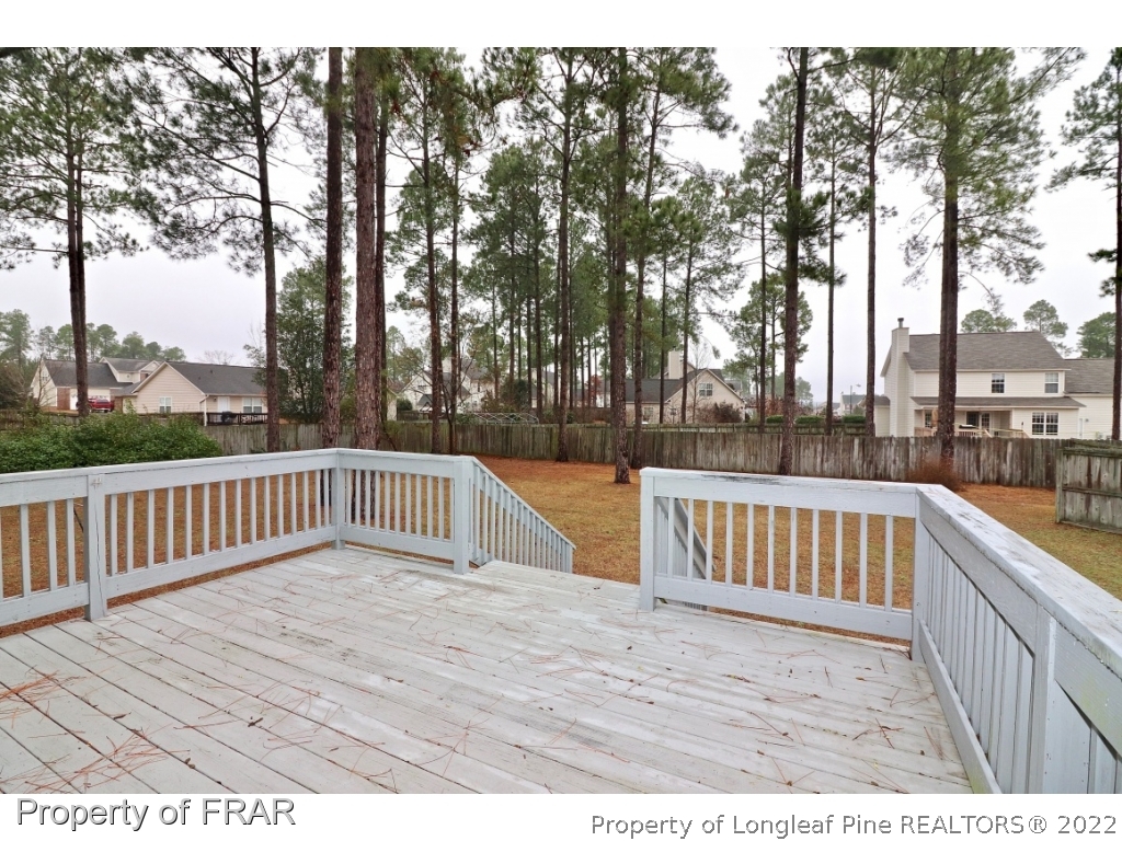45 Chesapeake Road Cameron, NC 28326 - Photo 32 of 35 a view of balcony with wooden floor and fence