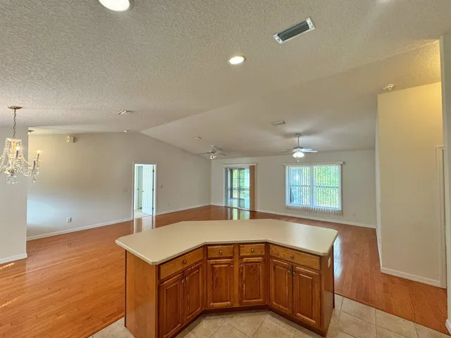 a view of a swimming pool with a yard