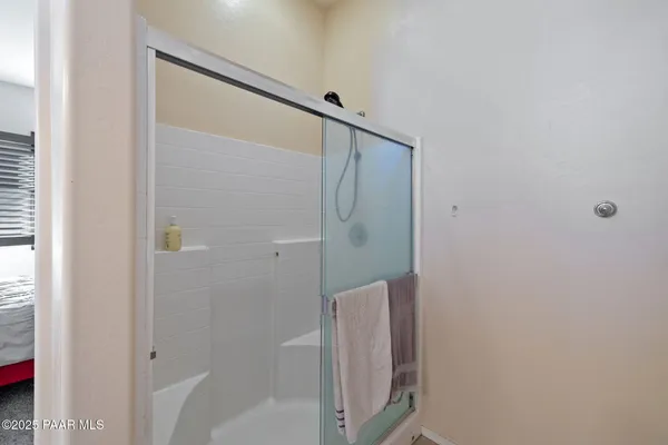 a view of a house with snow on the background