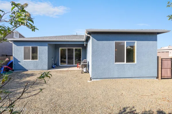 an aerial view of houses with outdoor space