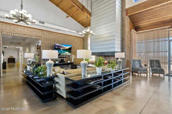 a room with furniture and pool table