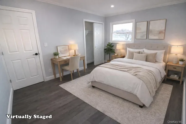 a bedroom with a bed and a table