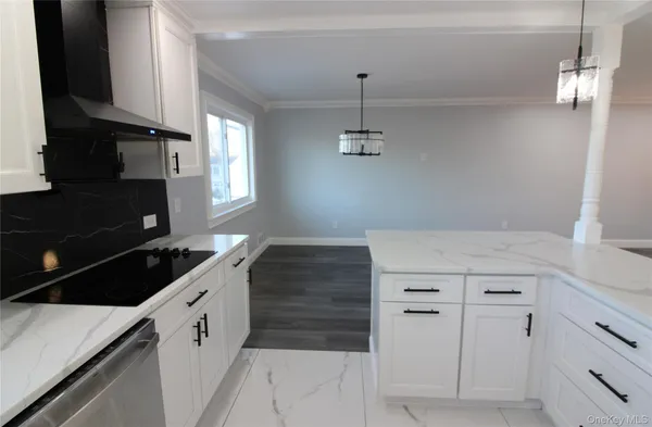 a kitchen with a stove and a refrigerator
