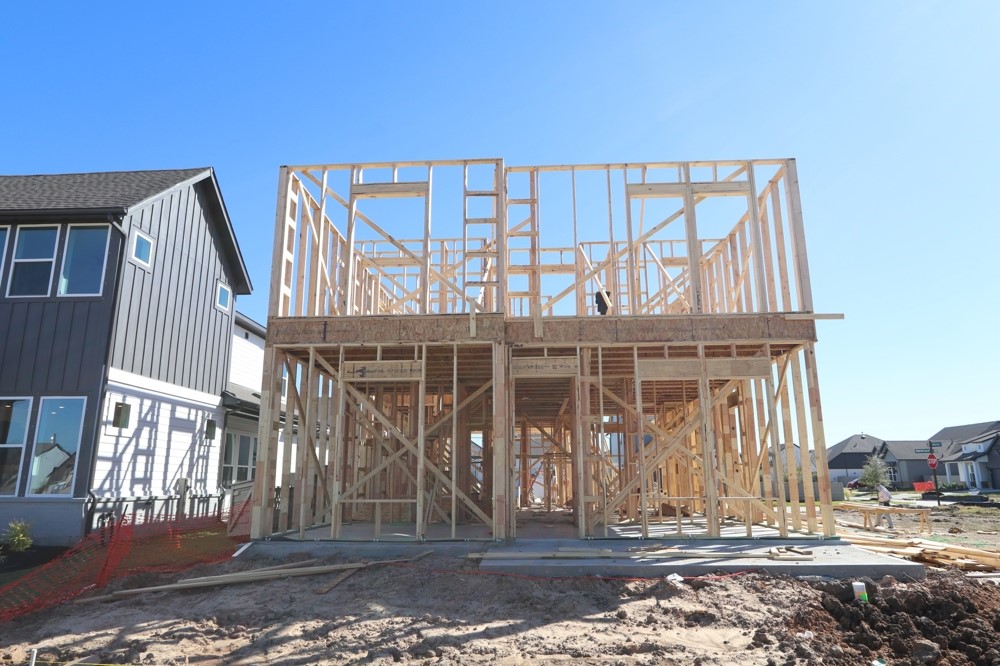 5519 Bonfire Alley Manvel, TX 77578 - Photo 9 of 21 a front view of a house with large trees