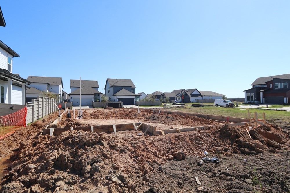 5519 Bonfire Alley Manvel, TX 77578 - Photo 12 of 21 a view of a house with a yard and sitting area