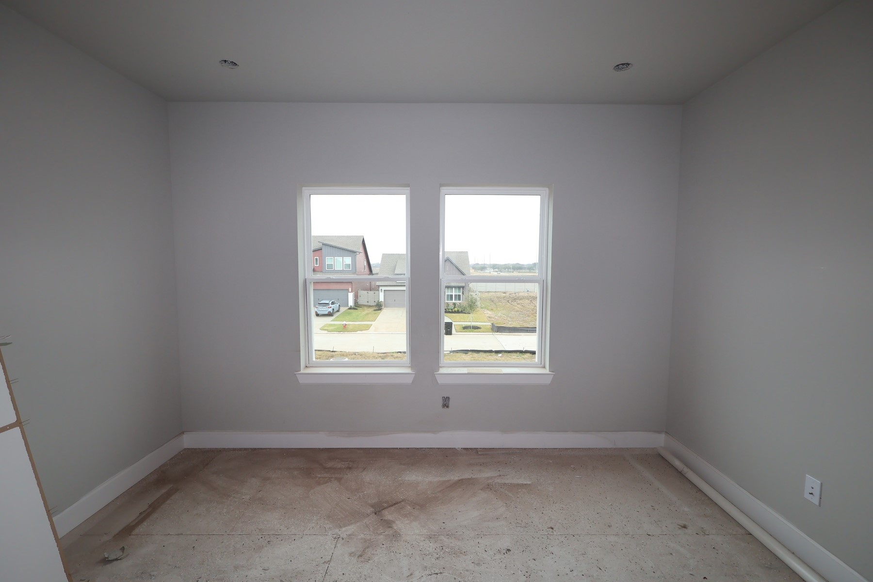 5519 Bonfire Alley Manvel, TX 77578 - Photo 3 of 21 an empty room with a window
