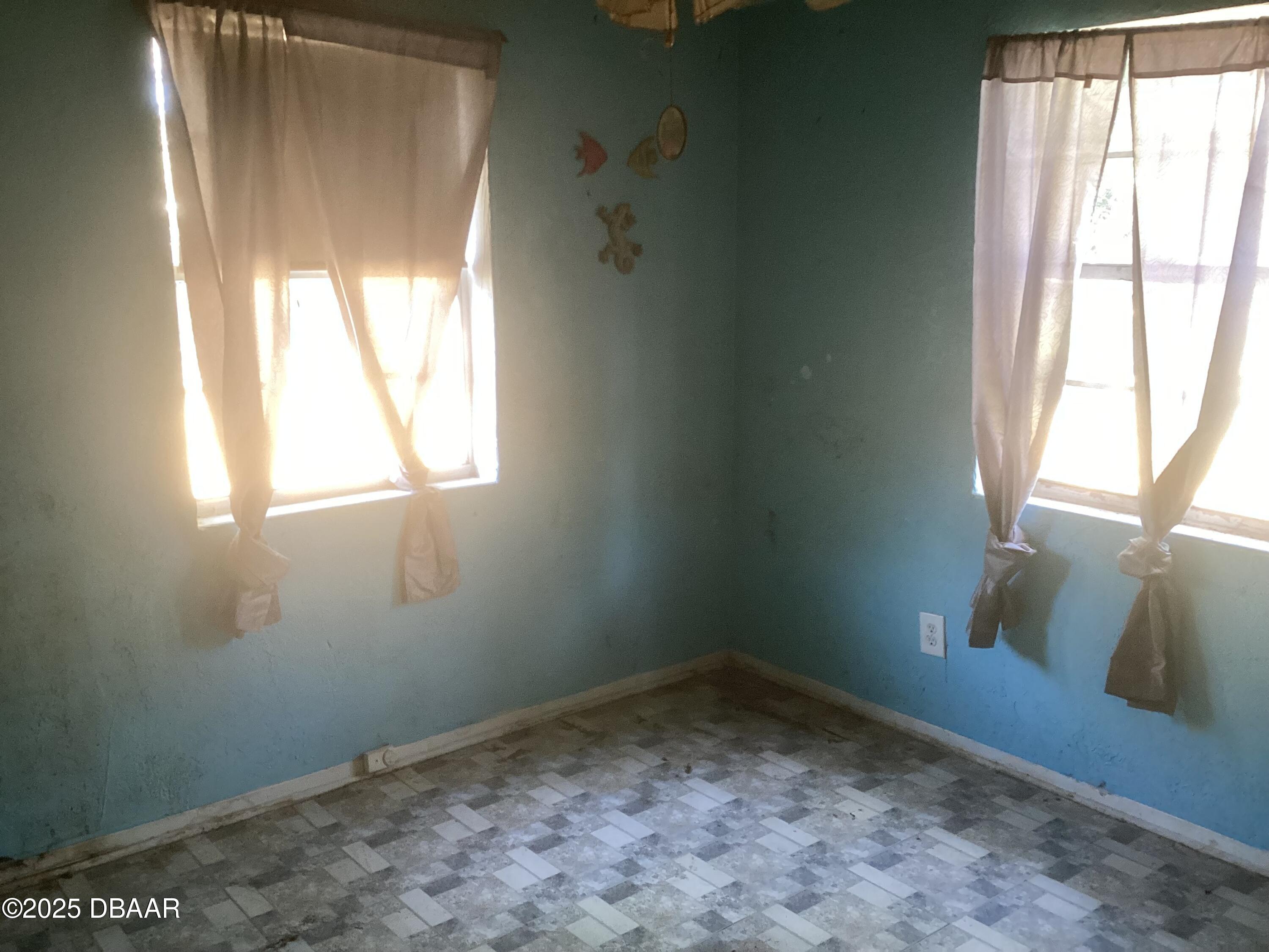 142 Holland Road Ormond Beach, FL 32176 - Photo 12 of 15 a room that has a window in it