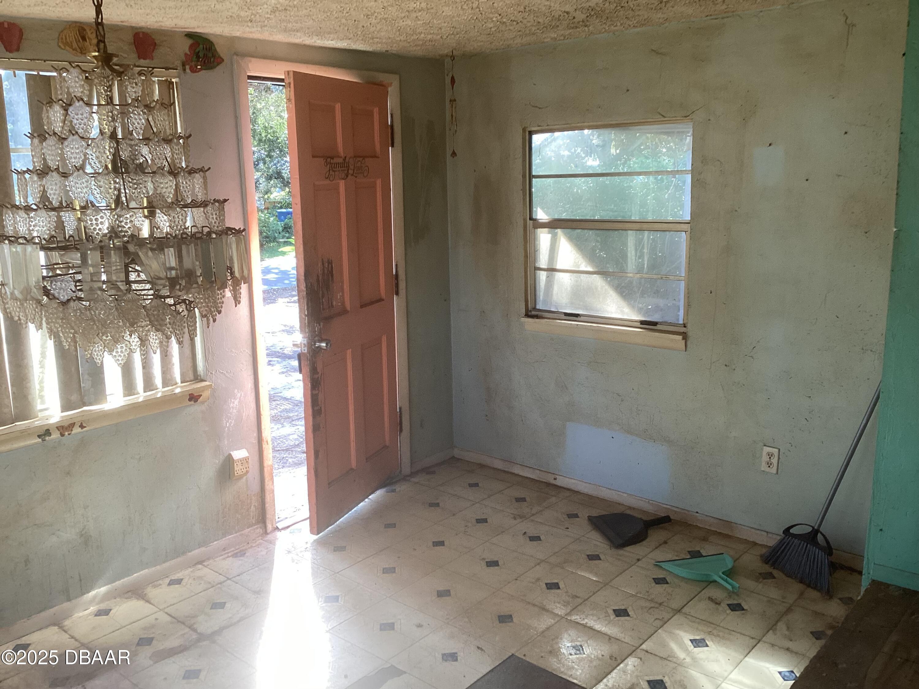 142 Holland Road Ormond Beach, FL 32176 - Photo 13 of 15 a bathroom with a sink and a window