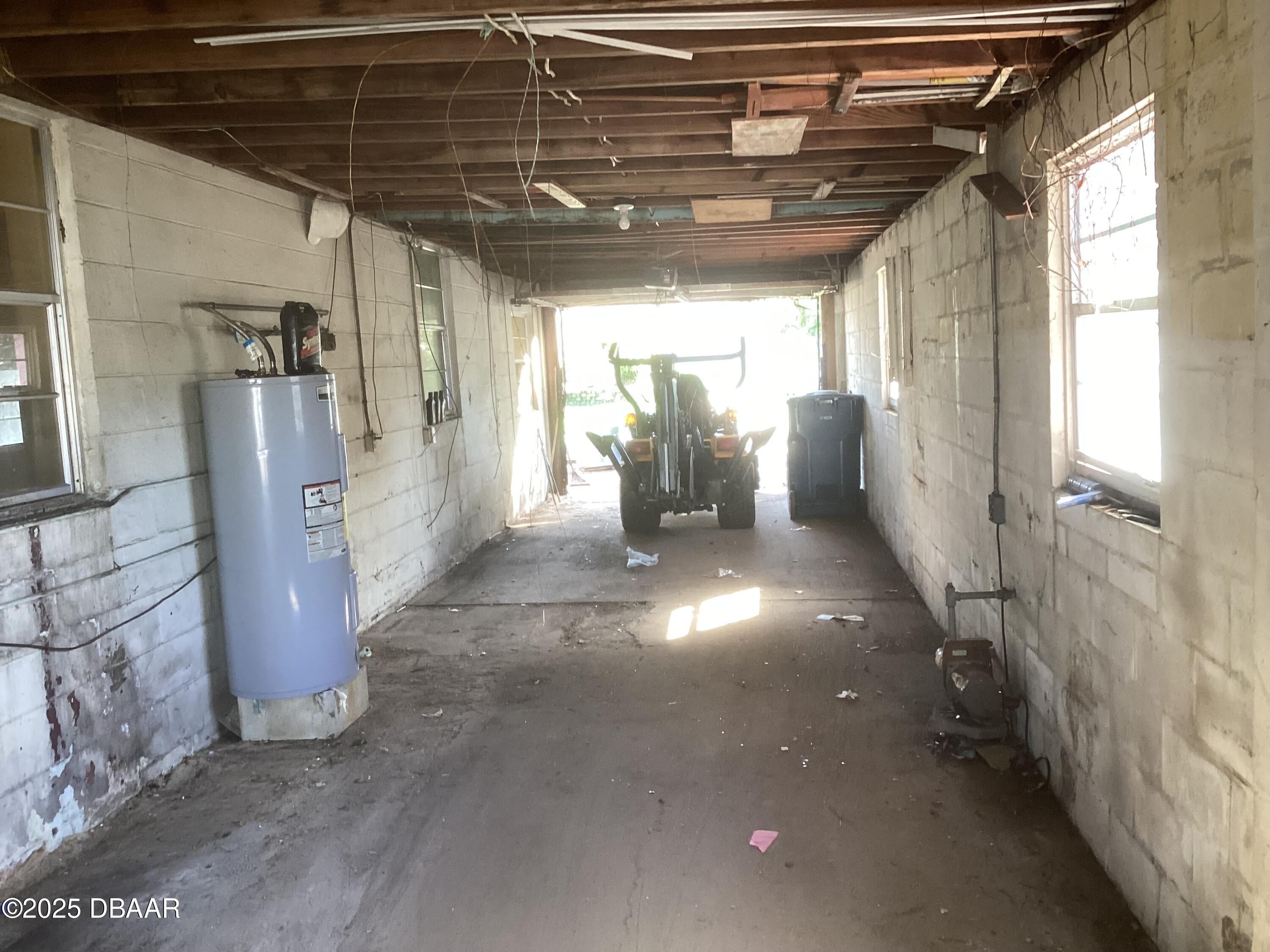 142 Holland Road Ormond Beach, FL 32176 - Photo 4 of 15 a view of empty room with wooden floor