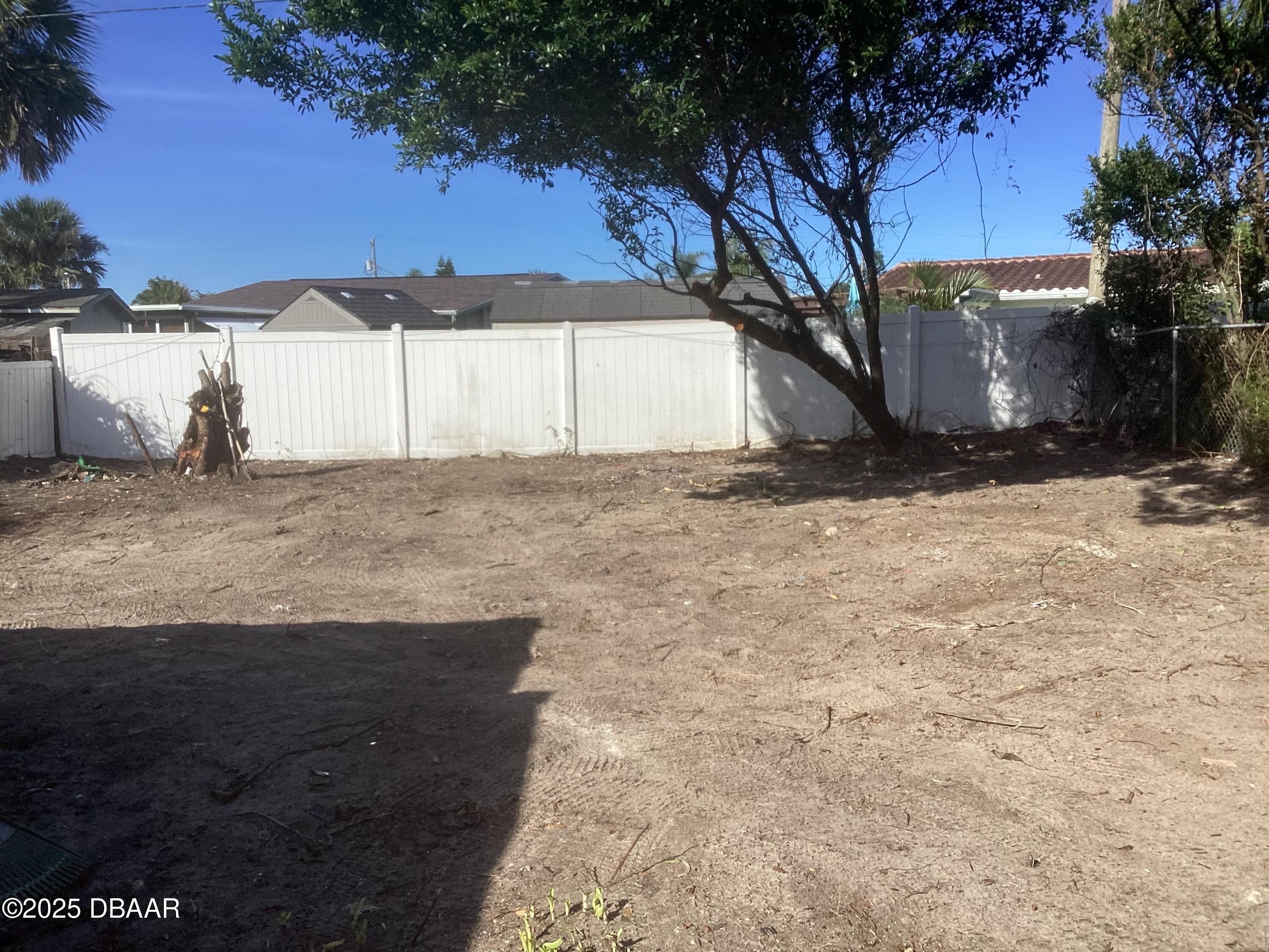 142 Holland Road Ormond Beach, FL 32176 - Photo 5 of 15 a view of a backyard of the house