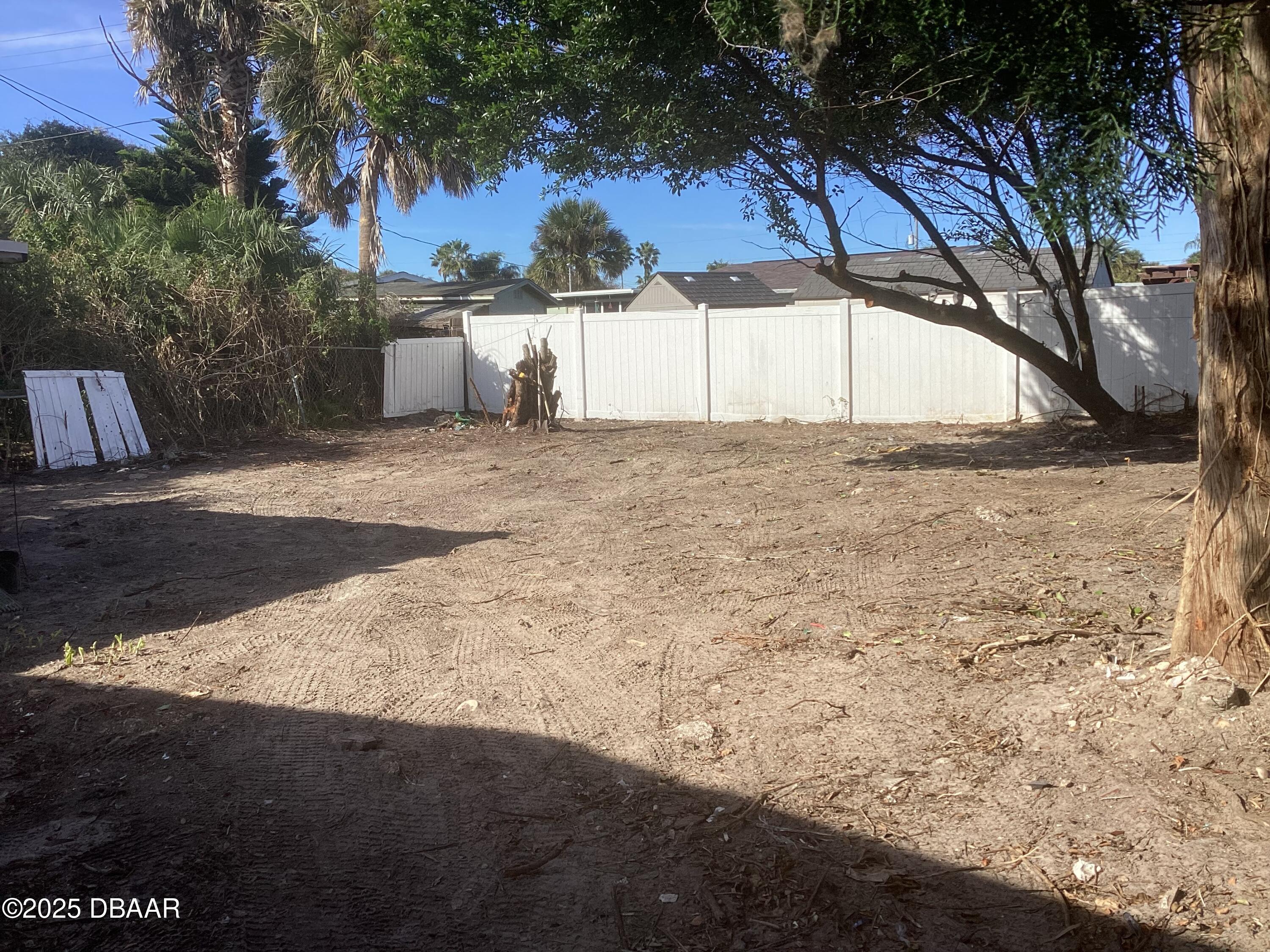 142 Holland Road Ormond Beach, FL 32176 - Photo 8 of 15 a view of a backyard of the house
