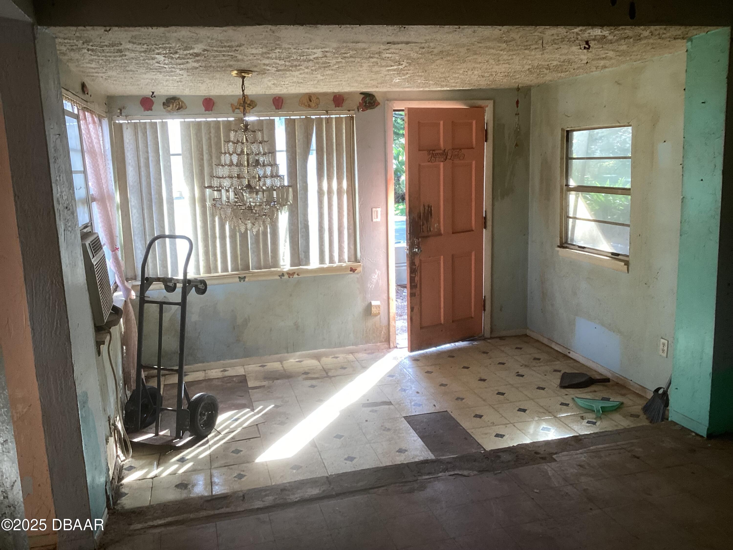 142 Holland Road Ormond Beach, FL 32176 - Photo 10 of 15 a view of entry way with wooden door