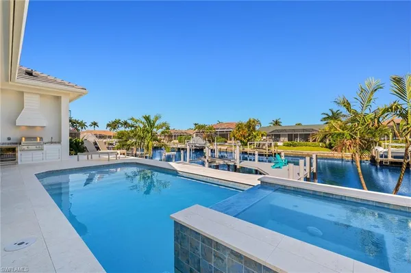 a view of a living room and dining room