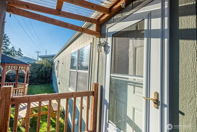 a view of balcony with furniture