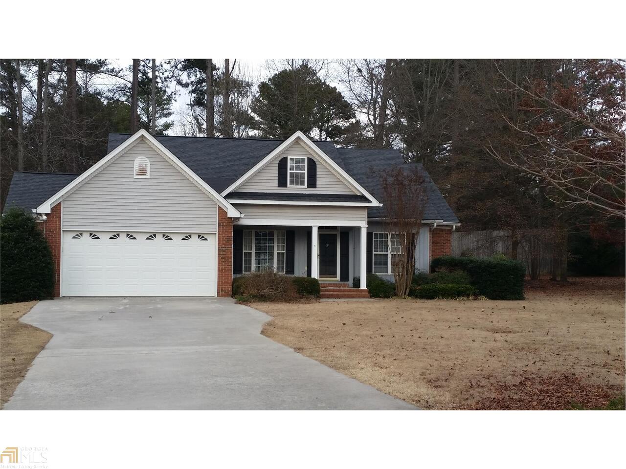 3 Preakness Court Southeast, Unit 17 Rome, GA 30161 - Photo 1 of 1 a black and white photo of a house