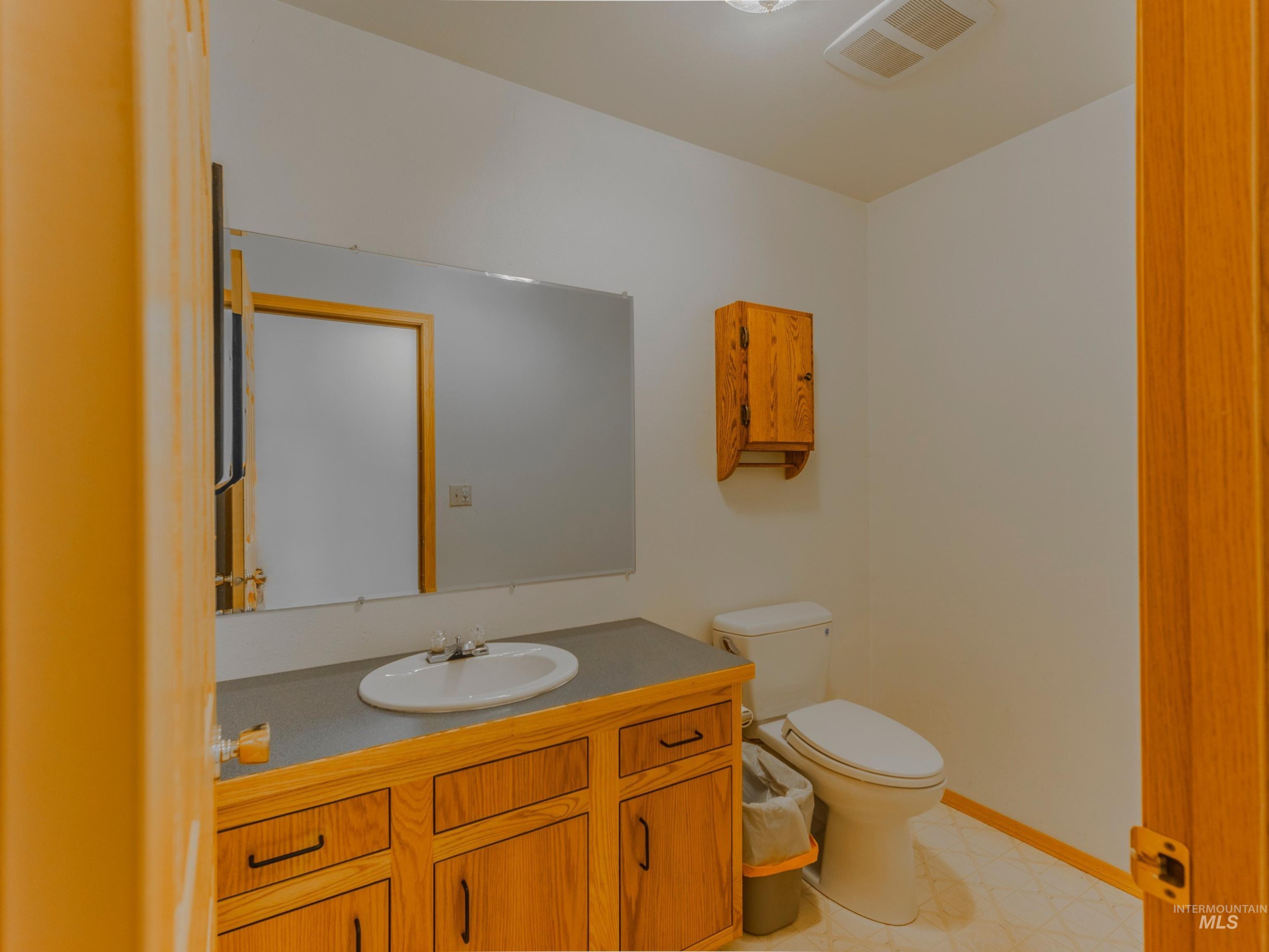 202 Fish Hatchery Road Grangeville, ID 83530 - Photo 39 of 50 Bathroom with vanity and light flooring