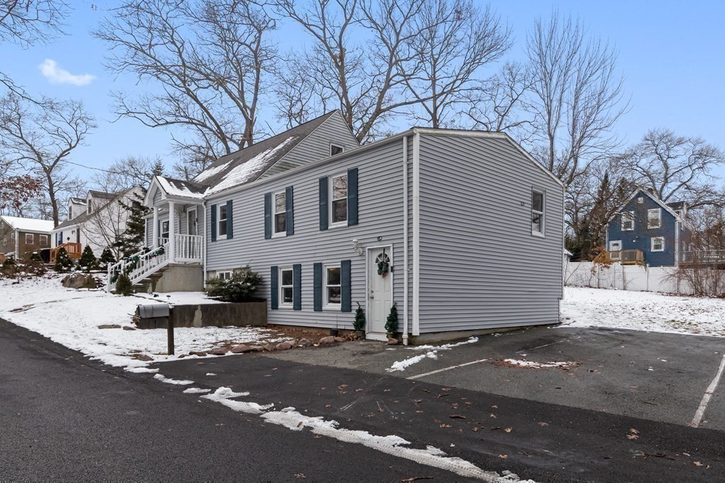 76 Rockefeller Street Randolph, MA 02368 - Photo 38 of 40 a front view of a house with a street