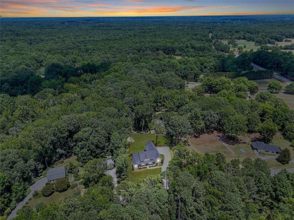 2053 John Stowe Road Monroe, GA 30656 - Photo 6 of 66 an aerial view of residential house with outdoor space and trees all around