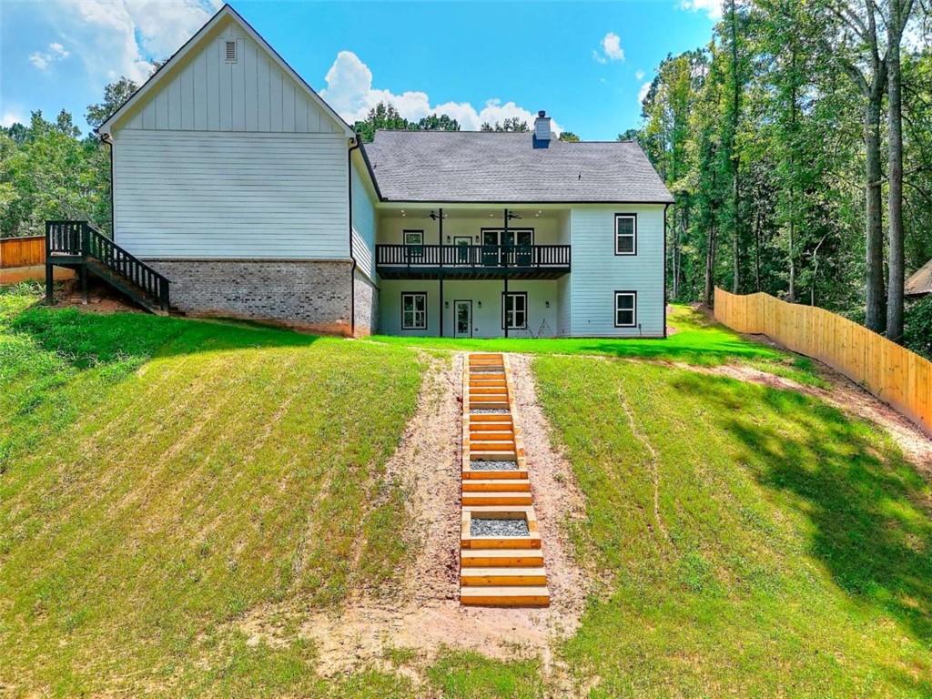 2053 John Stowe Road Monroe, GA 30656 - Photo 66 of 66 a front view of a house with yard