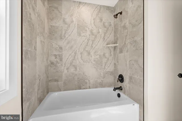 a bathroom with a bathtub