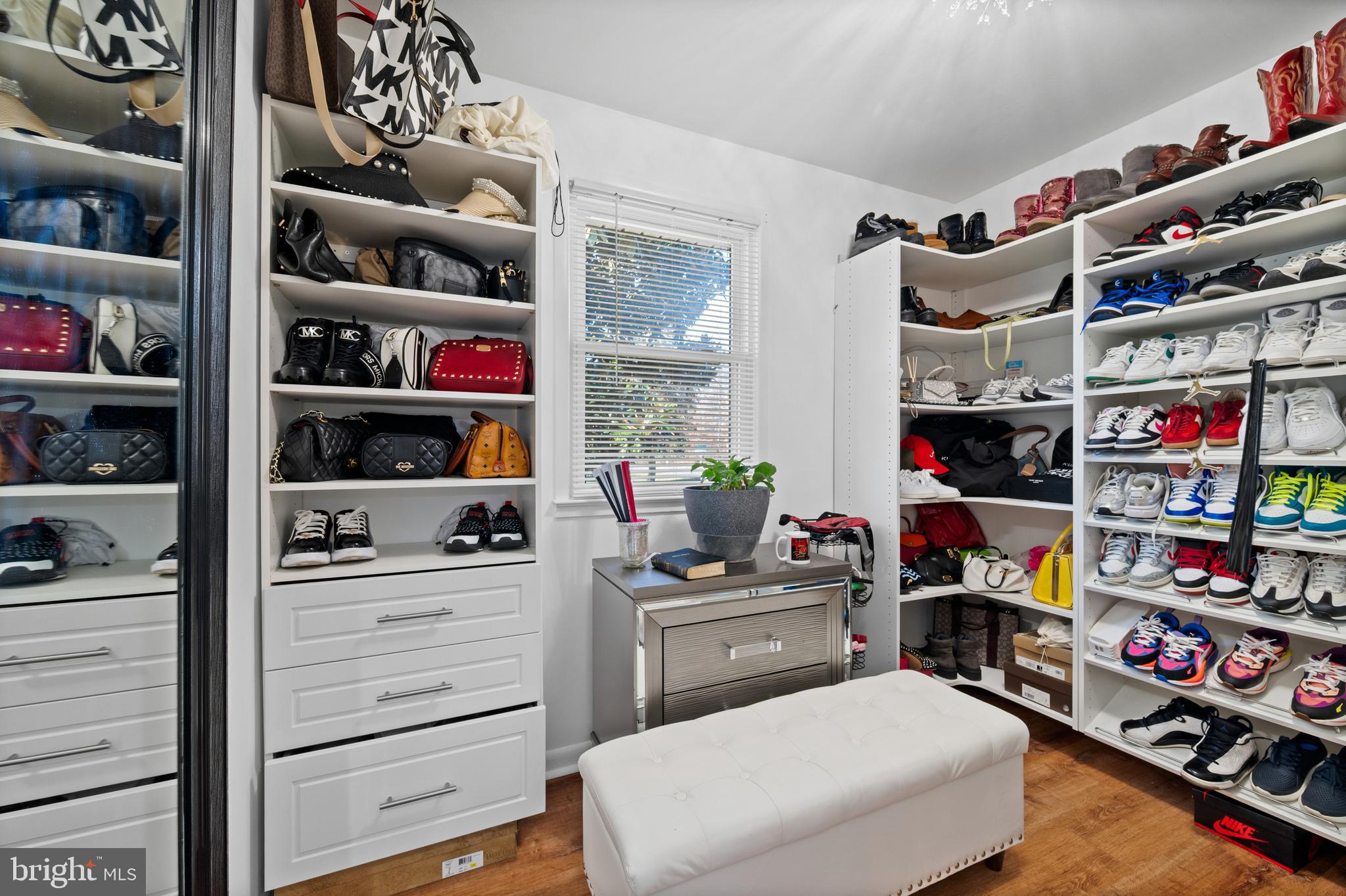 8900 Townsend Lane Clinton, MD 20735 - Photo 17 of 30 a view of walk in closet with clothes and shoes