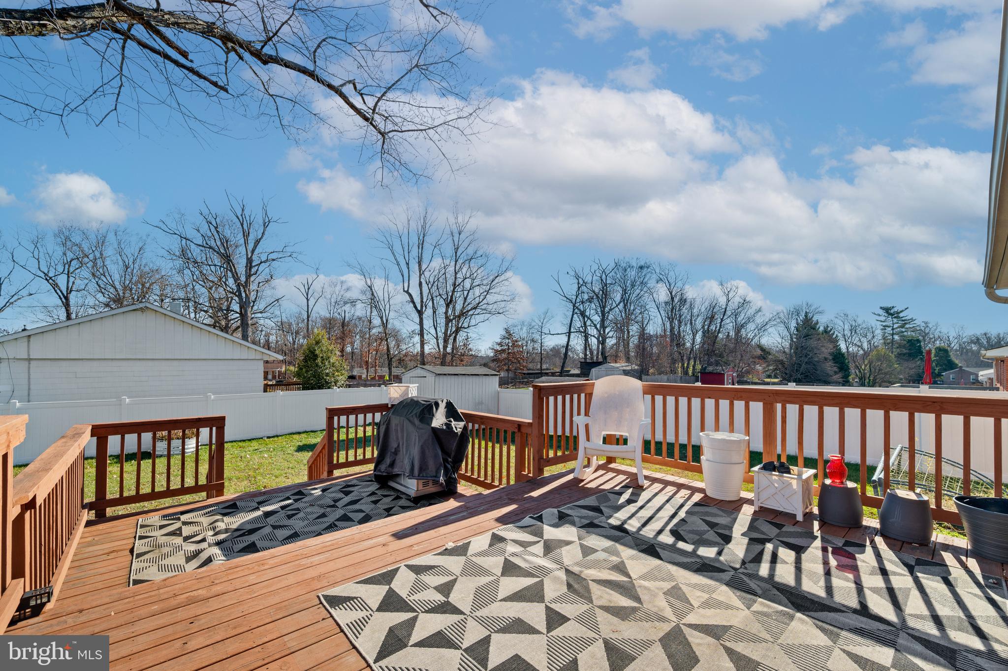 8900 Townsend Lane Clinton, MD 20735 - Photo 22 of 30 a view of a terrace with sitting area