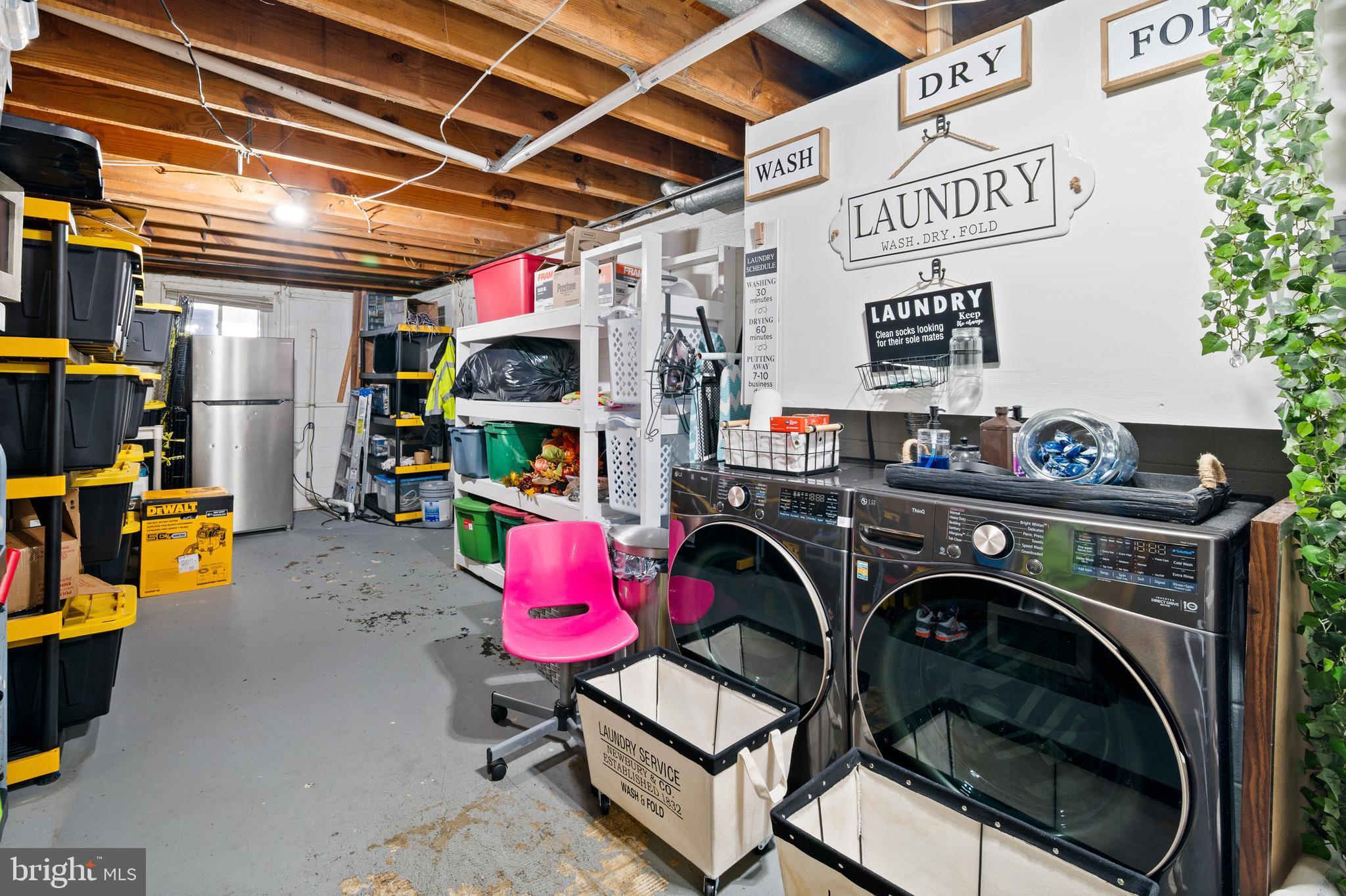 8900 Townsend Lane Clinton, MD 20735 - Photo 23 of 30 a utility room with dryer and washer