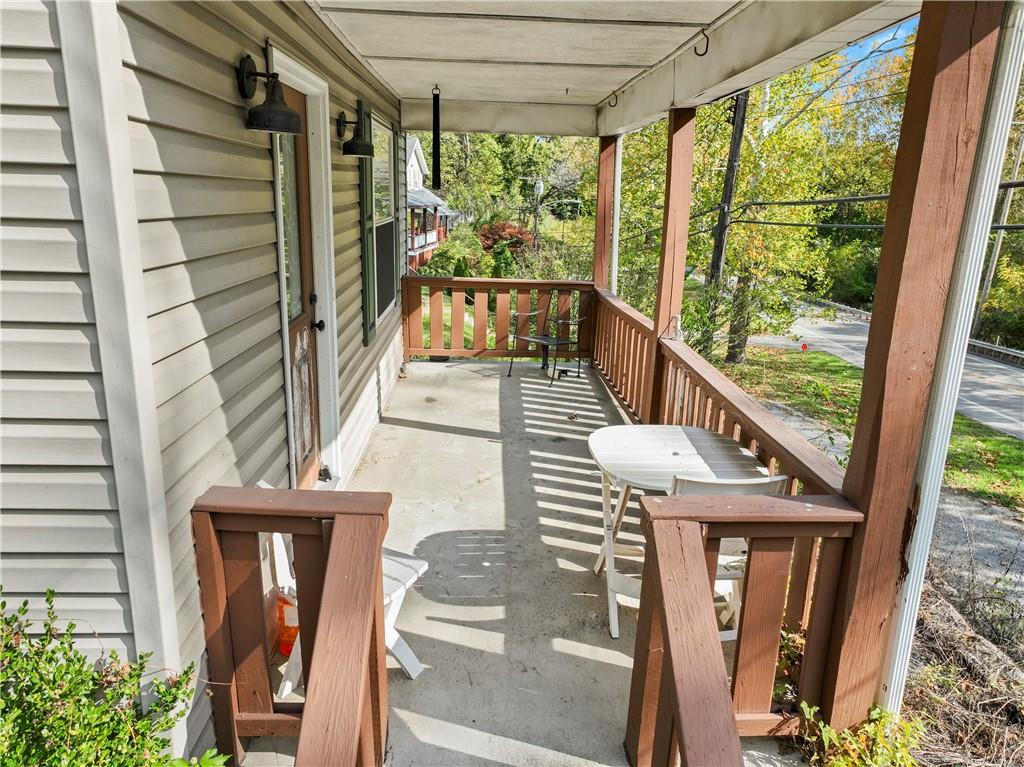1217 25th Street Beaver Falls, PA 15010 - Photo 11 of 32 a view of balcony with wooden floor and furniture