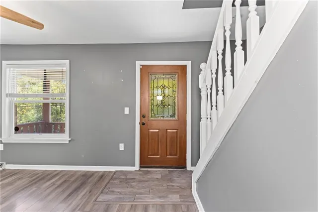 a view of an entryway with a livingroom