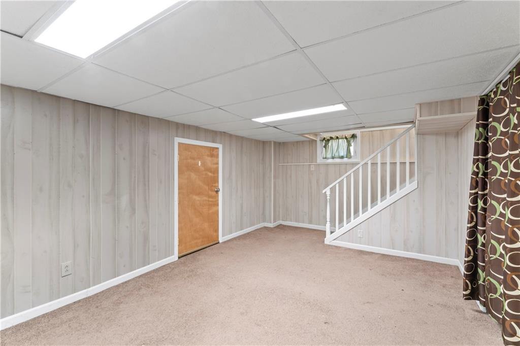 1217 25th Street Beaver Falls, PA 15010 - Photo 27 of 32 a view of an empty room with a window